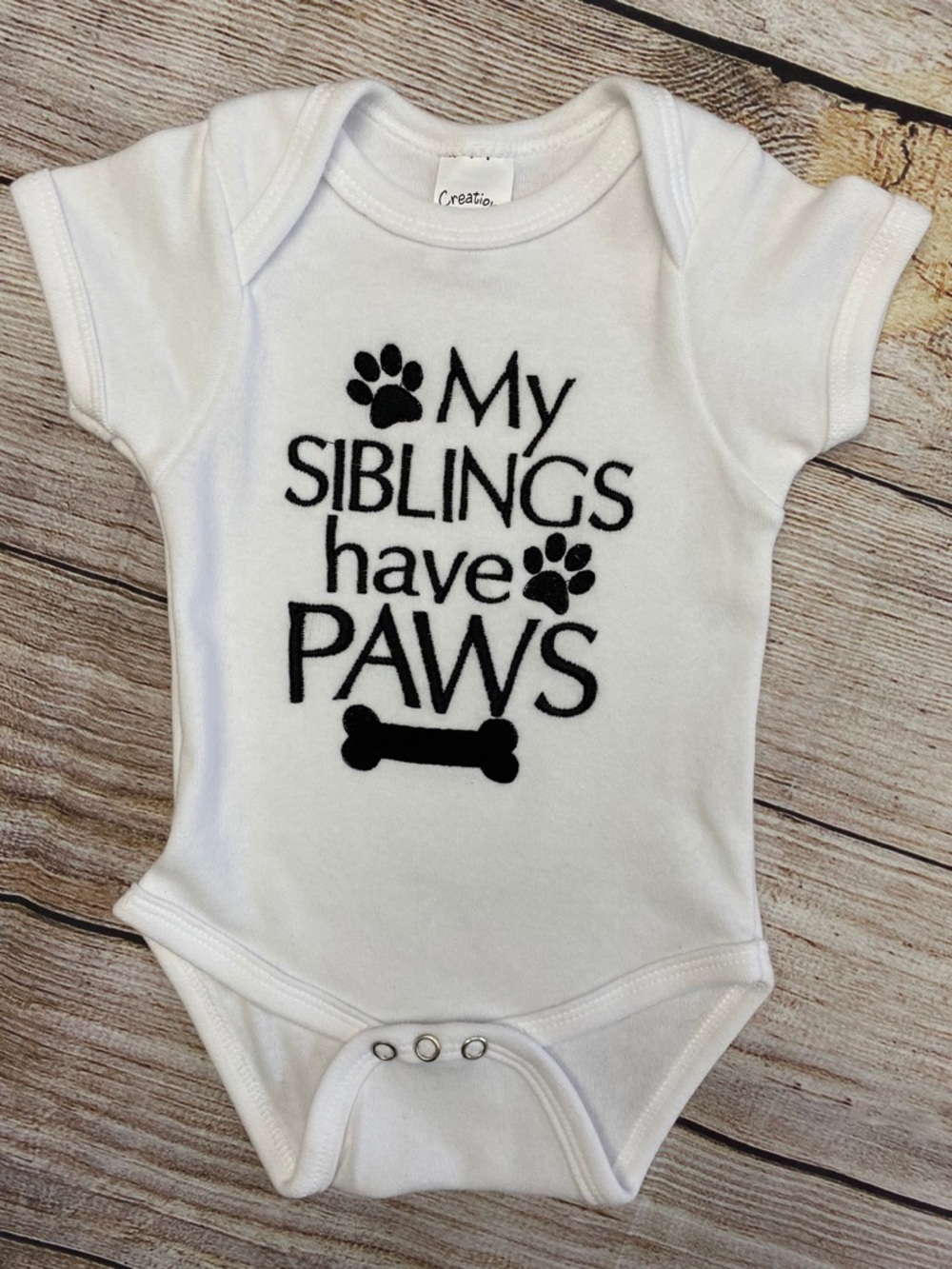 Creatio White Dog-Themed Baby Onesie - My Siblings Have Paws